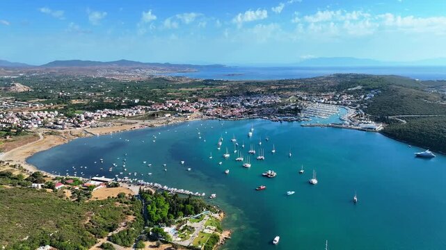Peaceful Aerial View of Teos Marina and Sığacık, Izmir Turkey - Aerial view of Teos Marina and Sığacık in Izmir, Turkey, featuring a peaceful harbor, boats and clear blue Aegean Sea.