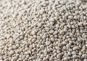 Fototapeta premium Close up view of pale, granular limestone sand providing natural texture, widely utilized for construction, mineral sourcing, and landscaping applications, quarry, particulate, natural resources
