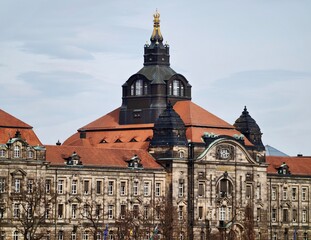 Magnificent lightfilled stone palace featuring gilded dome and surrounding cityscape layouts © Vladimir