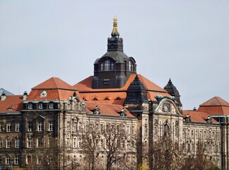 Old civic building with decorative features. Ancient city hall with detailed stone craftsmanship © Vladimir