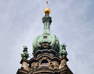 Elaborate copper structure decorated with verdigris finish and intricate baroque stone embellishments © Vladimir