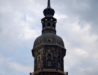 Weathered stone adorns architectural features. Sculpted ornaments and layered textures embellish domes © Vladimir