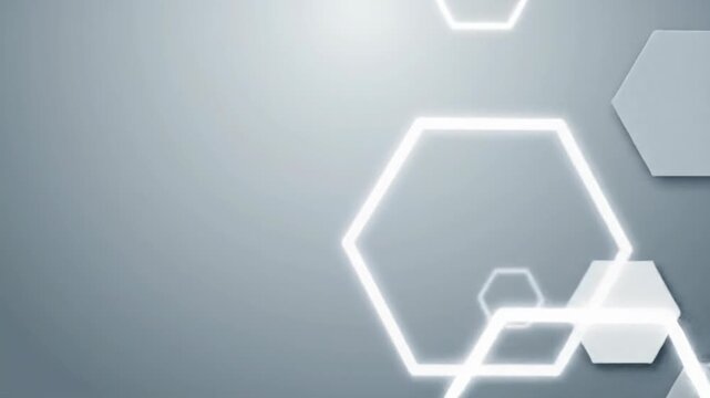 light grey hexagonal shapes gently emerge and drift on a pristine soft neutral grey canvas with diffused light, creating a serene, evolving digital pattern. modern corporate future concept
