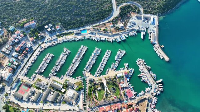 Peaceful Aerial View of Teos Marina and Sığacık, Izmir Turkey - Aerial view of Teos Marina and Sığacık in Izmir, Turkey, featuring a peaceful harbor, boats and clear blue Aegean Sea.
