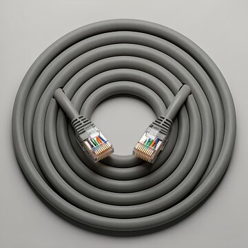 Coiled CAT6 cable displaying RJ45 in flat lay