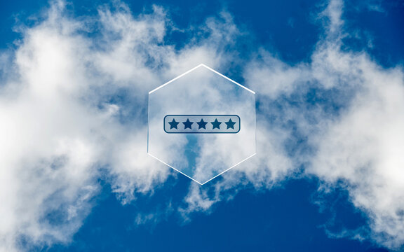 Five star rating icon on hexagonal glass plate against blue sky and white clouds background for customer feedback review satisfaction and business excellence concept
