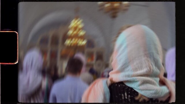 Orthodox woman praying during a church service
