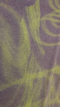 Abstract green light patterns projecting on a wall