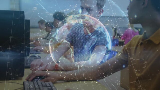Students typing, activating globe overlay growing over monitors, collaborating for technology class