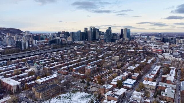 defaultAerial view of Griffintown Montreal and Lachine Canal with winter cityscape and river at daytime. g.