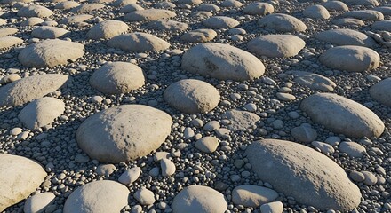 Obraz premium Smooth rounded stones on a pebbled beach shore