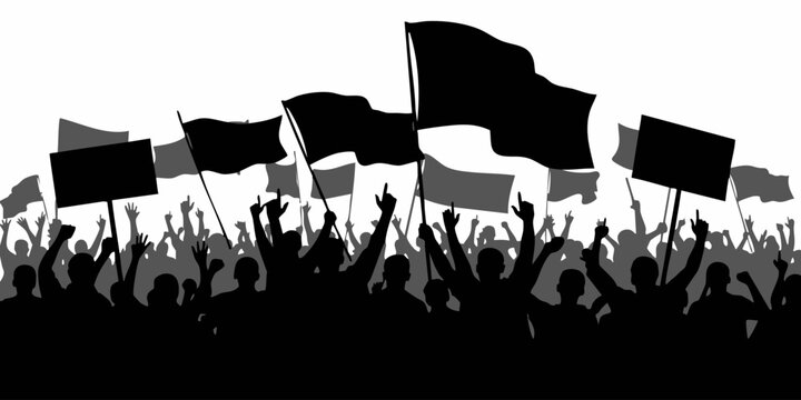 Protesters hold signs and flags in a demonstration downtown at night