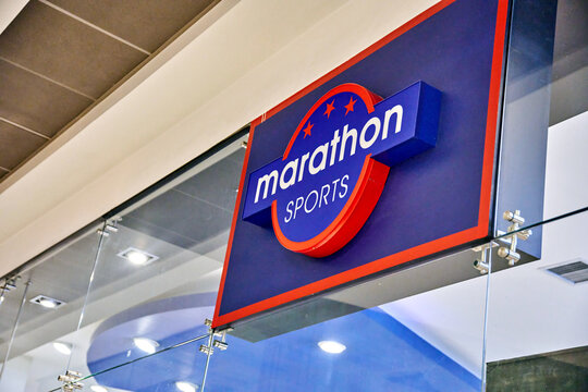Ambato, Ecuador - June 09, 2025: Marathon Sports store sign in Mall de los Andes, Ambato, showcasing vibrant branding and modern design elements in a shopping environment