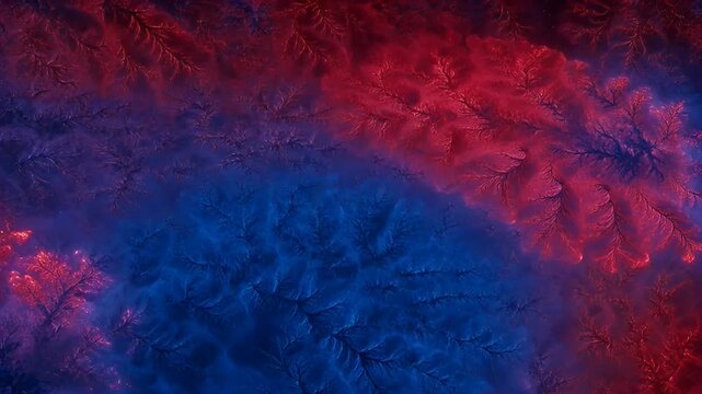 Abstract dendritic formations resembling river deltas in hues of red and blue