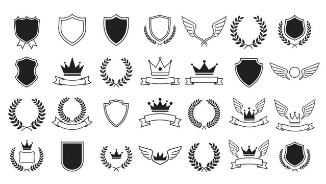 Heraldic design elements set with shields crowns laurel wreaths wings and banners for logos emblems and royal branding.