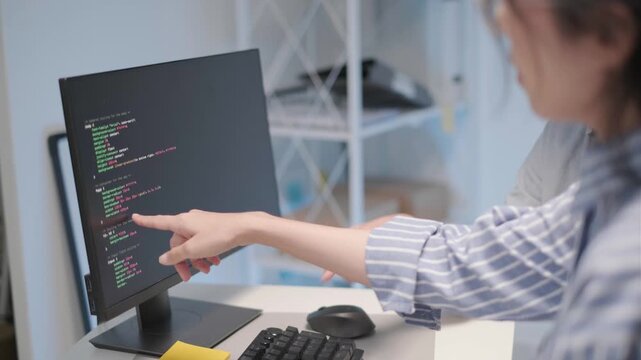 Programmer software engineer application server database developer coding working computer laptop indoor office, business information technology concept