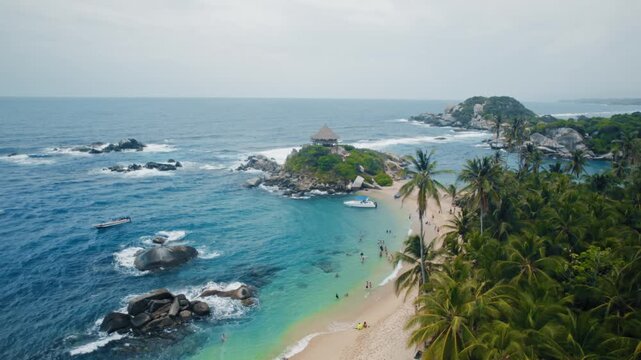 Aerial view of Tayrona National Park beach with clear blue water and p