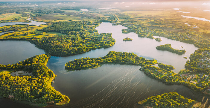 Lyepyel, Lepel Lake, Beloozerny District, Vitebsk Region. Aerial View Of Lyepyel Cityscape Skyline In Autumn Morning. Morning Fog Above Lepel Lake. Top View Of European Nature From High Attitude In