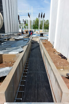 Vertical shot of the Control cable installation at the cable trench from electrical equipment in the switchyard to control room of substation.