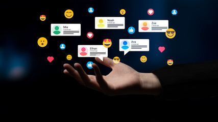 A hand is reaching out to a collection of vibrant social media icons, symbolizing digital...