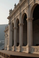 Naklejka premium A classical stone building with intricate carvings stands serene in warm golden light at dawn or dusk.