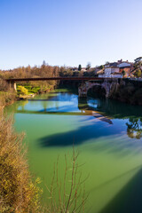Obraz premium Old bridge of Mazères and its new pedestrian footbridge crossing the Hers river, Occitanie, France