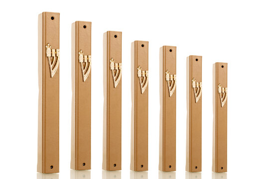 Mezuzah, close-up, isolated on white.
