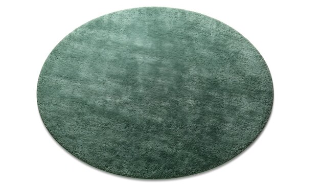 Round fluffy rug in muted teal adds a soft touch to flooring in interior design project
