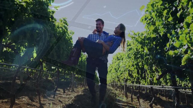 Man lifting woman then walking vineyard row, chart overlays and lens flares promoting travel ads