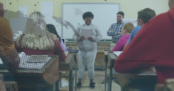 Student presenting front starting reading papers for class, dotted globe fading revealing desks