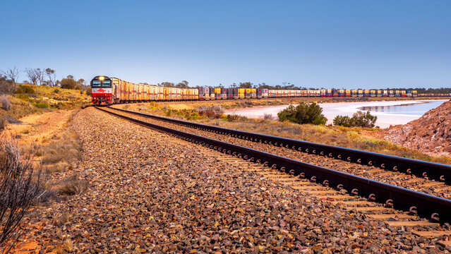 Freight train running along Lake Hart in South Australia's outback DIGITAL CAMERA