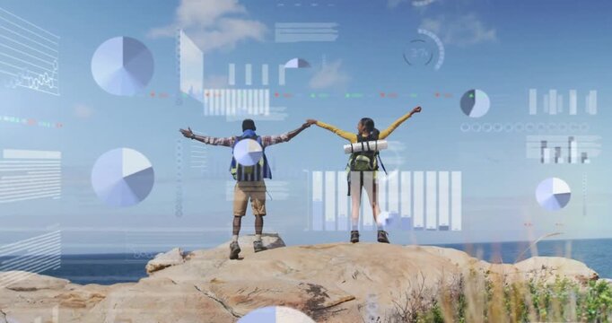 Two hikers reaching top and holding extending arms cheering as HUD charts drifting settling travel