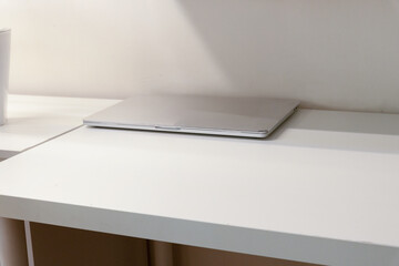 Minimal desk with laptop for home study concept