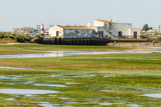 Historic building on marsh in Ria Formosa Natural Park