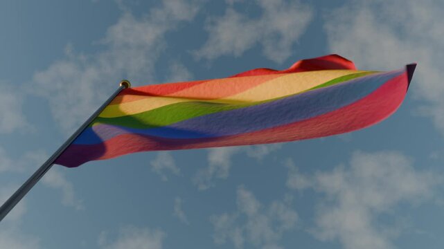 The peace flag waving in the sky for pride month