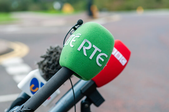 Microphones from UTV, BBC Newsline and RTE outside Parliament Buildings, Stormont, Belfast