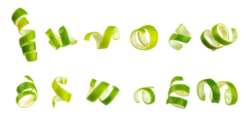 Fresh lime zest isolated on white background. Lime zest or peel close-up. Grated citrus peel. Lime...