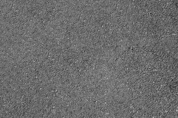 Naklejka premium Top view of urban street road highway with concrete border, sidewalk Asphalt road top aerial view background Transportation backdrop black Asphalt texture stones with bitumen