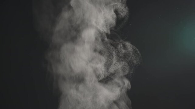 Steam rising fast from pot with boiling water