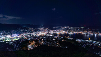 Fototapeta premium Magical hour night view of Nagasaki city and harbor from Mount Inasa.