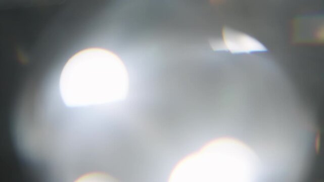 Real lens flare overlay or background from lens with glass elements in front of it