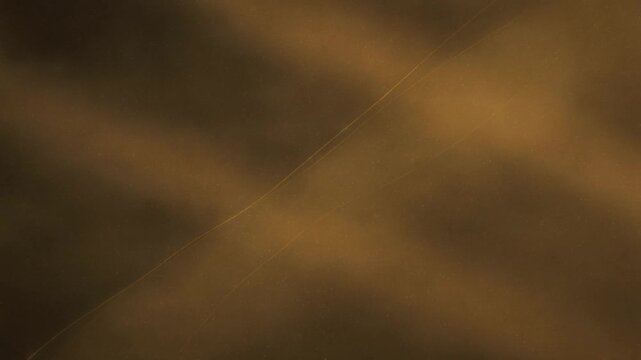 Amber chaff-line overlay with slow diagonal separation and soft one-by-one disappearance