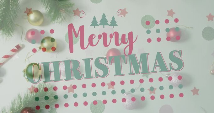 Animation of christmas greetings text over decorations