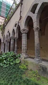 Sorrento winter mood with details of columns and porticoes in the ancient Cloister of San Francesco. Elegant arches and historic architecture in a quiet Italian setting.