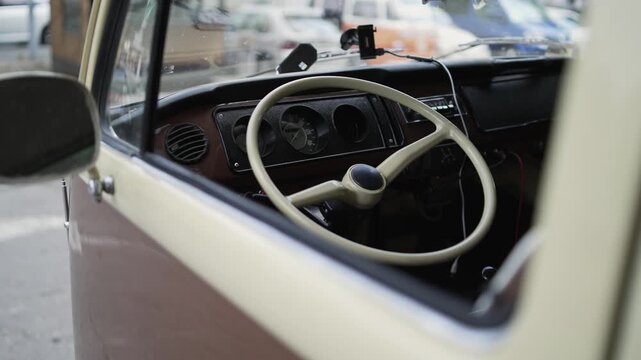 Vintage interior of an old van with retro inspired steering wheel and details