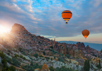 Hot air balloon flying over spectacular Cappadocia - Goreme, Turkey