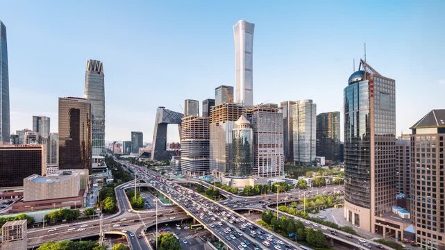 High angle timelapse of skyline and traffic flow at the Guomao Overpass in Beijing, China
