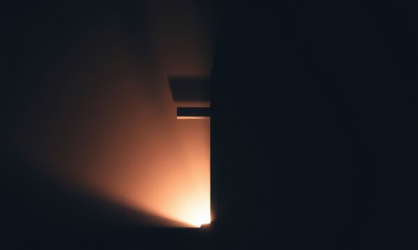Cross Emerging from Darkness Holy Week Dramatic Christian Background