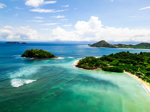 Scenic Seger Beach with Iconic Rock Formations and Turquoise Ocean in Kuta Lombok