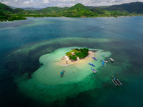 Serene Gili Sudak Island with Calm Turquoise Water and White Sand in Southwest Lombok